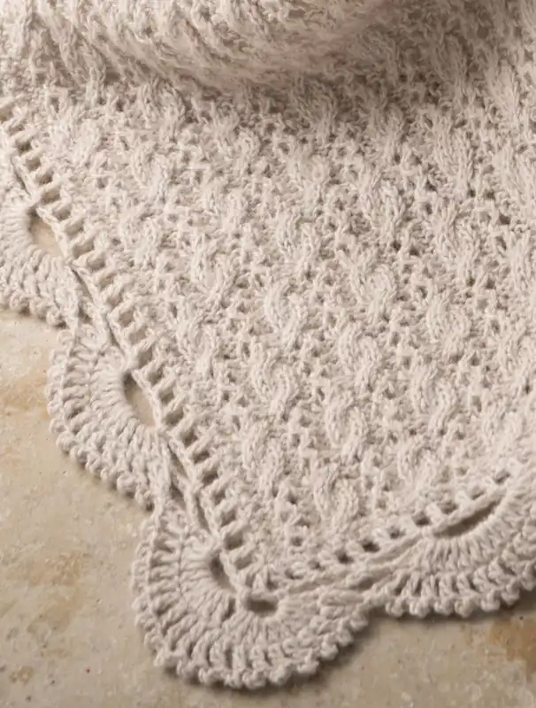 Babydecke mit Zopfmuster aus Ecopuno Geld-Zurück-Garantie