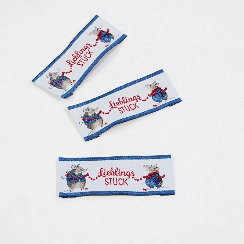 Webetikett kleine Maus – Lieblingsstück blau – Aufnäher von acufactum 2×5,7cm Schnäppchen