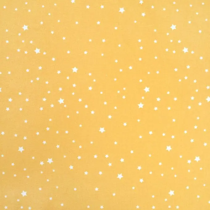 Echt Weicher und matter beschichteter Baumwollstoff in gelb mit weißen Sternen