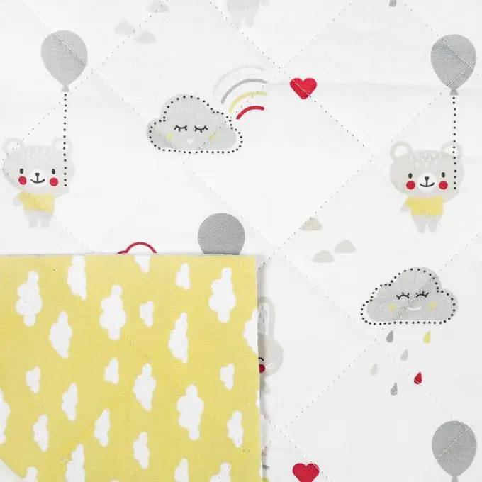 Sonderaktion Gelber Steppstoff mit Wolkenmuster, 150 cm Breite