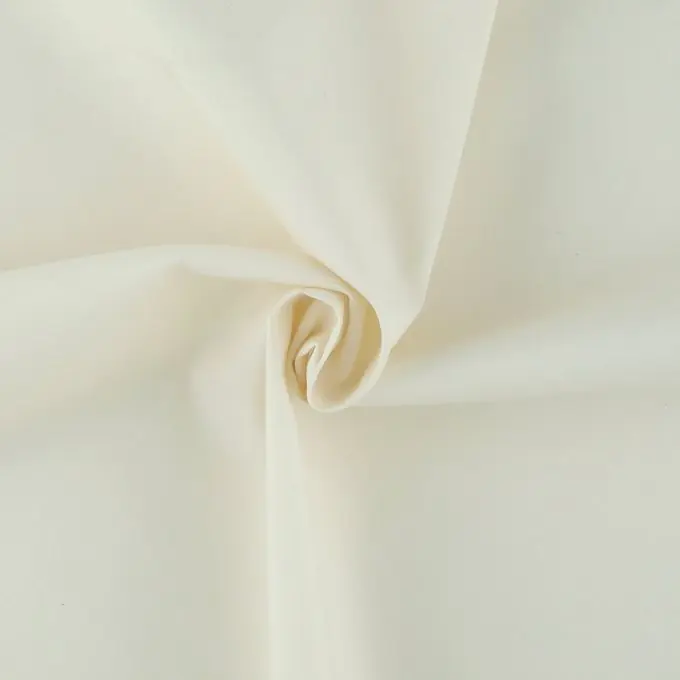 Einfarbiges ecrufarbenes Baumwollmischgewebe Beliebt