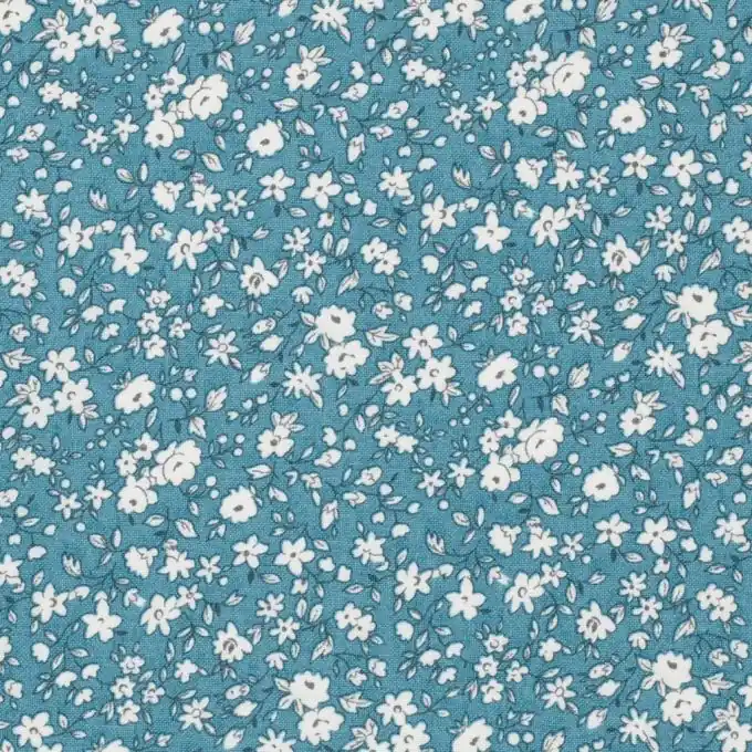 Jetzt Bestellen Baumwollstoff Leonie kleine weiße Blüten 160cm Blau